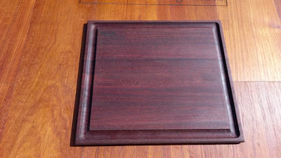 Wooden steak board with big juice groove. 