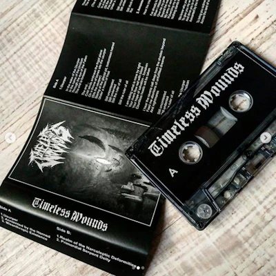 TIMELESS WOUNDS - GRIM DIMENSIONS OF ROT (PART II) [TAPE]