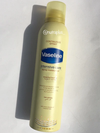 Vaseline intensive care spray moisturizer essential healing