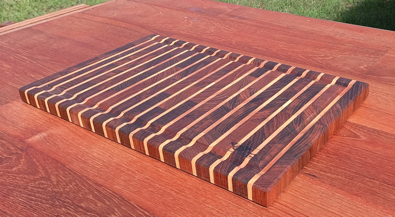 Vertically white lined end grain cutting board (SOLD)