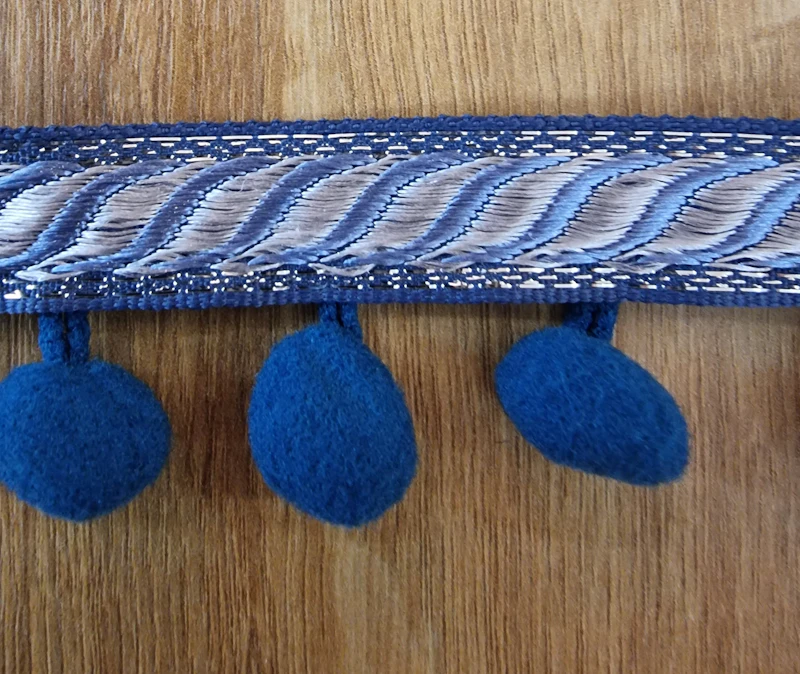 Pom Pom Borte mit Glitzer