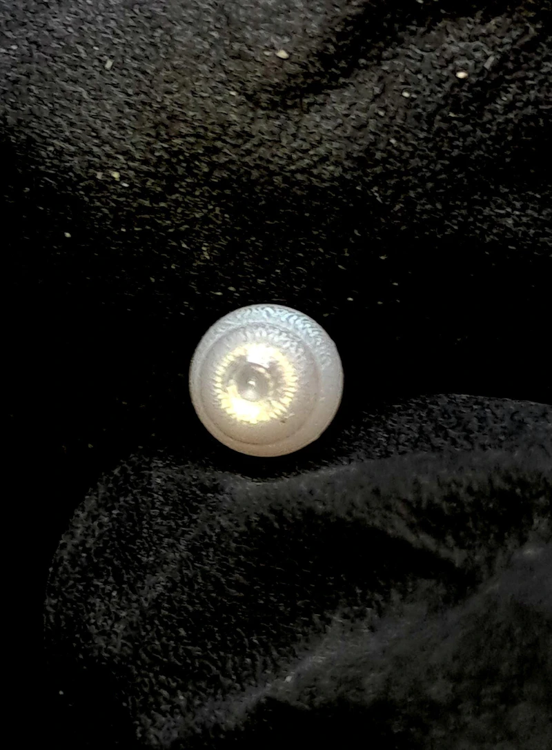 Graceful Natural 1.20 carat Drop Tridacna Pearl