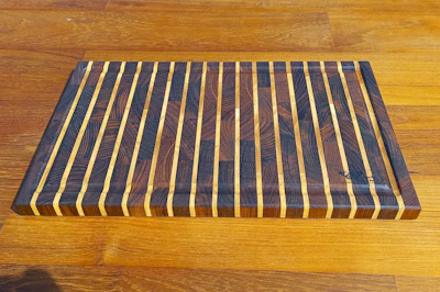 Vertically white lined end grain cutting board (SOLD)