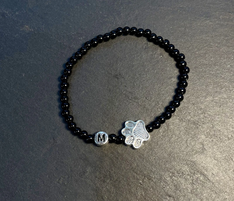 Hundetatze mit Initialien
