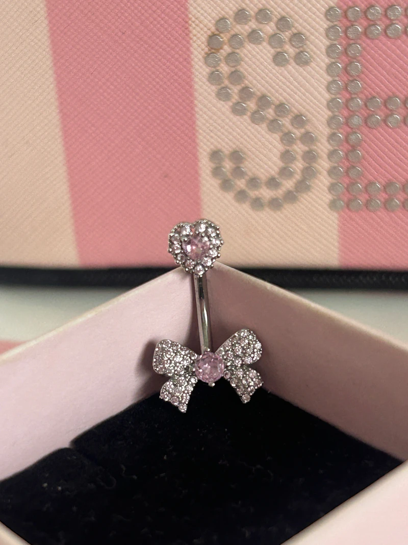  Pink bow belly bar  